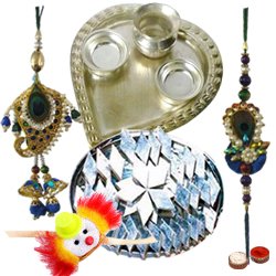 Spectacular Display of Silver Plated Paan Shaped Puja Aarti Thali Delectable Kaju Katli Bhaiya Bhabhi Rakhi Set and Kids Rakhi with Free Roli Tilak and Chawal for Rakhi Celebration