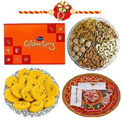 Lovely Brotherly Love Gift of Cadbury Celebration Chocolate Pack Mixed Dry Fruits Haldiram Kesar Peda Shree Thali and 1 Trendy Zardoji Rakhi with Free Roli Tika and Chawal Lovely Brotherly Love Gift of Cadbury Celebration Chocolate Pack Mixed Dry Fruits Haldiram Kesar Peda Shree Thali and 1 Trendy Zardoji Rakhi with Free Roli Tika and Chawal