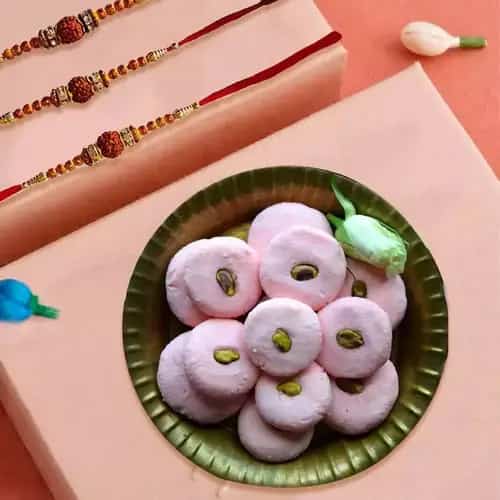 Beautiful Rudraksha Rakhi Trio with Sandesh Beautiful Rudraksha Rakhi Trio with Sandesh