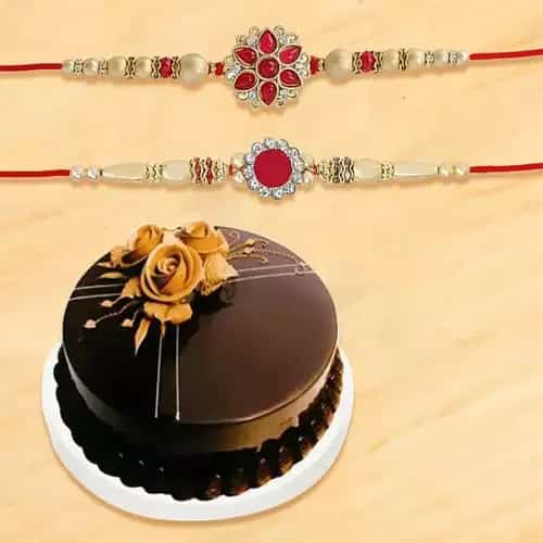 Attractive Rakhi set of 2 with Chocolate Cake Attractive Rakhi set of 2 with Chocolate Cake