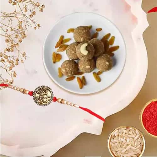 Astonishing Rakhi with Besan Laddoo Astonishing Rakhi with Besan Laddoo