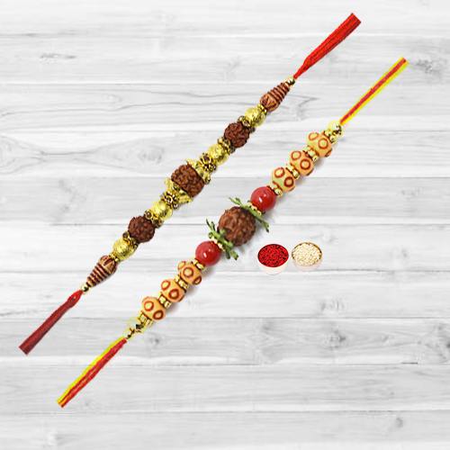 Fashionable One Pair of Rudraksha Rakhi along with free Roli Tika and Chawal for Cute Brother Fashionable One Pair of Rudraksha Rakhi along with free Roli Tika and Chawal for Cute Brother