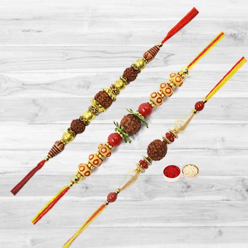 Remarkable Rakhi Special Gift of Three Rudraksha Rakhi with free Roli Tika and Chawal Remarkable Rakhi Special Gift of Three Rudraksha Rakhi with free Roli Tika and Chawal
