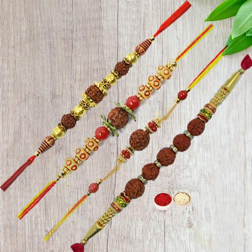 Beautifying Display of Four Pious Rudraksha Rakhi with Free Roli Tika and Chawal for your Dear Ones Beautifying Display of Four Pious Rudraksha Rakhi with Free Roli Tika and Chawal for your Dear Ones