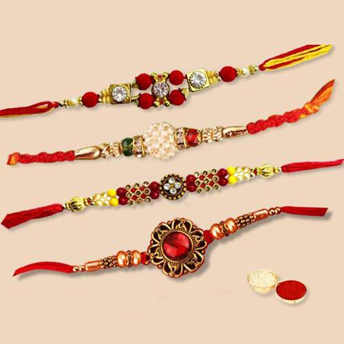 Gorgeous Set of 4 pc. Captivating Rakhi with free Roli Tilak and Chawal for your Precious Brother on the Occasion of Rakhi Gorgeous Set of 4 pc. Captivating Rakhi with free Roli Tilak and Chawal for your Precious Brother on the Occasion of Rakhi