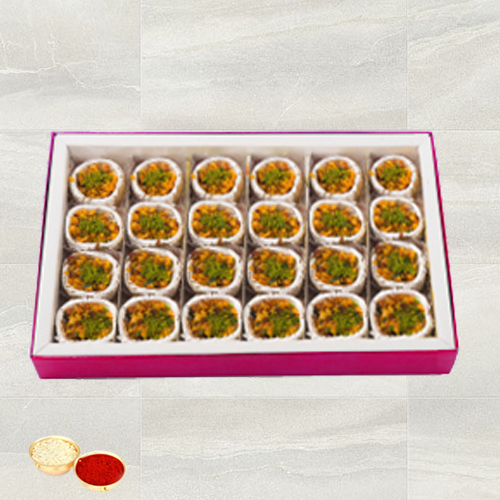 Kaju Pista Premium Sweets from Haldiram with free Roli Tilak and Chawal. Kaju Pista Premium Sweets from Haldiram with free Roli Tilak and Chawal.